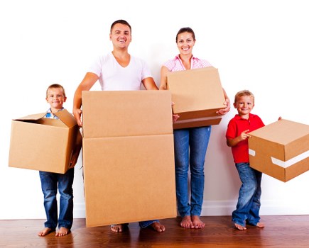 Professional movers packing items