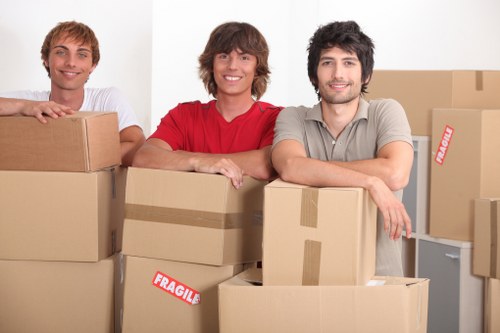 Professional movers loading furniture onto a truck
