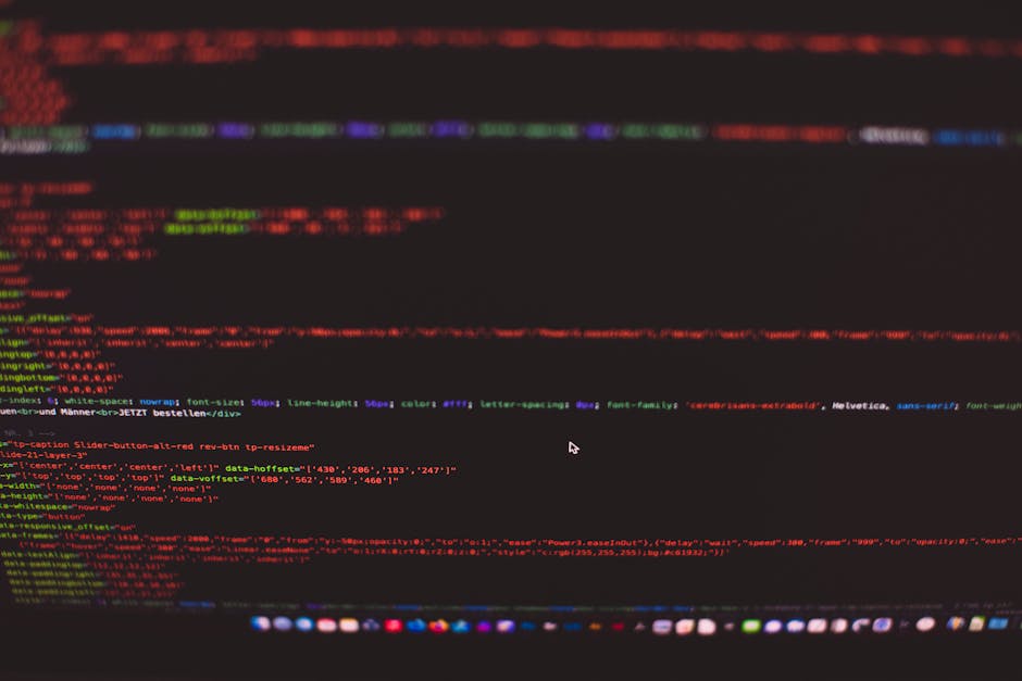 A computer screen displaying a code editor with HTML and CSS code visible, featuring lines of code such as meta tags, title, and stylesheet links. The screen is part of a workspace where web developme